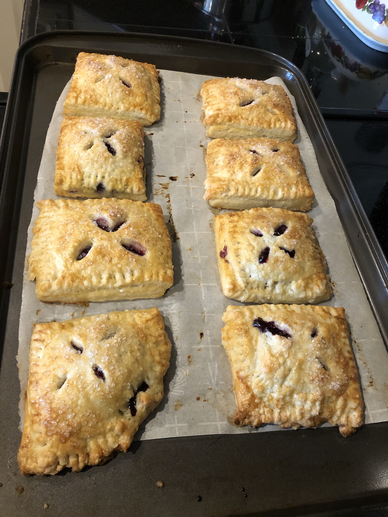 A pan of crispy blueberry pastries
